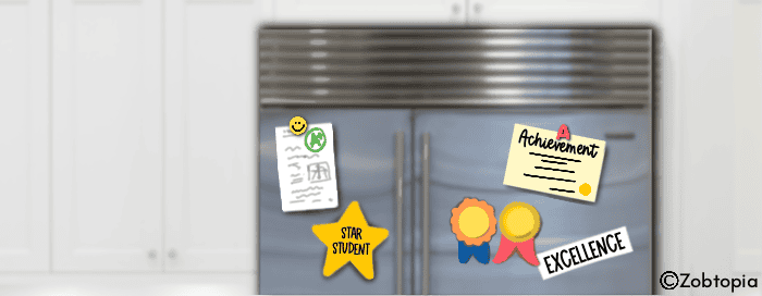 The image depicts the front of a stainless steel refrigerator adorned with various achievement-related magnets and notes. Among these are a yellow star-shaped magnet proclaiming "STAR STUDENT," two circular magnets resembling gold medal ribbons, and a white rectangular magnet boldly stating "EXCELLENCE." An "Achievement" note or certificate with some text beneath it is also visible, along with a small card featuring a smiley face icon. The refrigerator appears to be situated in a kitchen, with white cabinets partially visible to the left. This arrangement suggests a household that takes pride in displaying and celebrating academic or personal accomplishments.